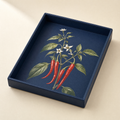 Navy faux leather serving tray with a botanical red chilli print on the base