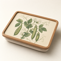 Wooden cushioned lap tray printed with a botanical study of a garden pea plant